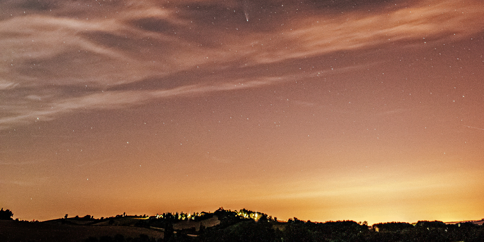 background image of a sunset and night sky